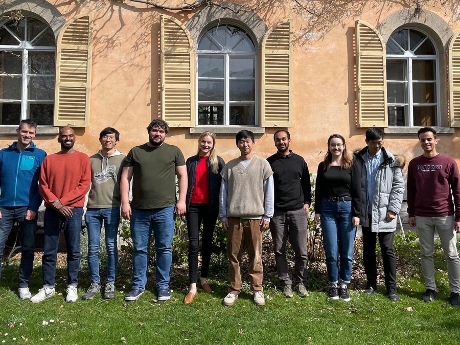 Lab members in front of a historic building